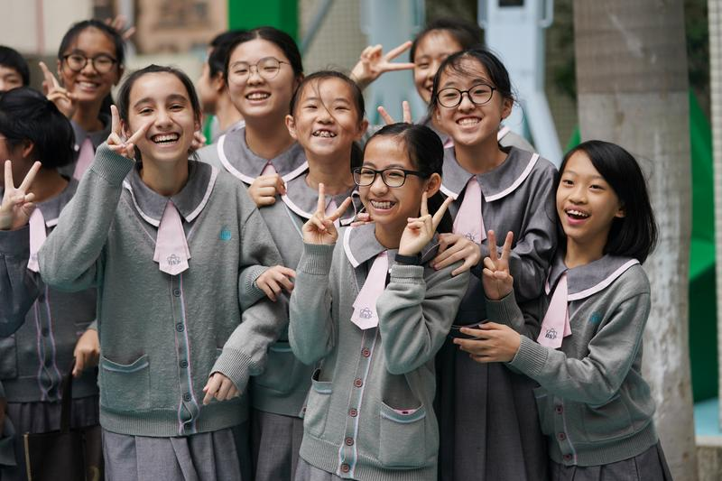 2019年12月19日,习近平总书记视察澳门濠江中学附属英才学校。图为当日拍摄的濠江中学附属英才学校学生。 新华社记者 王申/摄